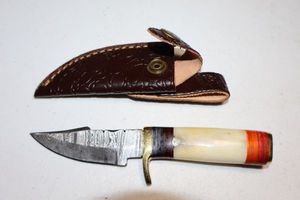 lot 124 image: Hunting knife with sheath
