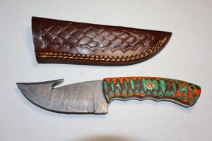 lot 155 image: Gut hook skinner knife with sheath