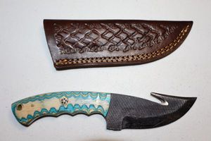lot 167 image: Gut hook skinner knife with sheath