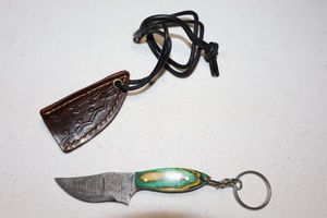 lot 276 image: Keychain knife with sheath