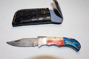 lot 291 image: Texas handle folding knife with sheath