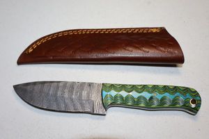 lot 308 image: Hunting knife with sheath