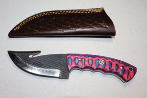 lot 309 image: Gut hook skinner knife with sheath
