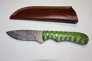 lot 312 image: Hunting knife with sheath