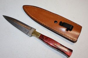 lot 389 image: Dagger knife with sheath
