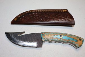 lot 399 image: Gut hook skinner knife with sheath