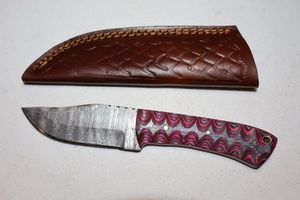 lot 322 image: Hunting knife with sheath