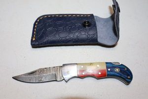 lot 330 image: Texas handle folding pocket knife with sheath