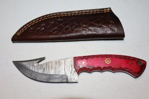 lot 334 image: Gut hook skinner knife with sheath