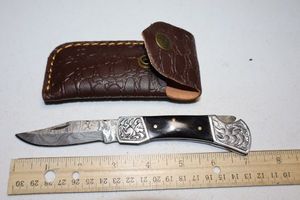 lot 371 image: Folding pocket knife with sheath