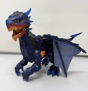 lot 12 image: INTERACTIVE WOWWEE DRAGON TOY. Vulcan Dark Blue Dragon Moves with touch and motion. 4 AAA batteries. Batteries included. Age 5 and up. Dimensions 7.5T x 11L x 6W
