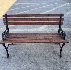 lot 14 image: WOOD &amp CAST IRON PARK BENCH