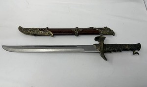 lot 15 image: DECORATIVE SWORD &amp SHEATH.&nbsp DETAILED MARKINGS. AN EXCELLENT DECOR PIECE. HEAVY 13L BLADE WITH HANDLE IT IS 19.5L