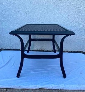 lot 18 image: CHARCOAL &amp BLACK WOVEN TOP TABLE WITH METAL LEGS.&nbsp 42L X 23W X 19T
