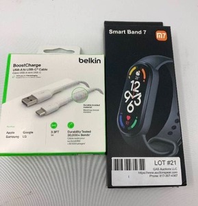 lot 21 image: Apple Smart Band 7 New in box. Compatible with IOS and Android. Heart rate monitor, calorie tracker, blood oxygen monitor, bluetooth compatible, water resistant up 50 meters. 2nd item Belkin 3.3 USB boost charger- to USB-A to USB Cable
