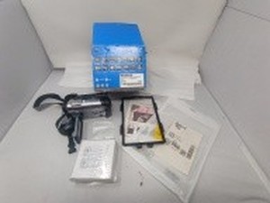 lot 63 image: 4 piece lot. 1 Air pods new in box. 2 Dome camera new in box. 3 Sony camera with straps. 4 Android case for Android pad.