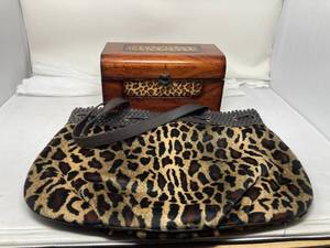 lot 124 image: JEWELRY BOX WITH LEOPARD PRINT FILLED WITH VTG AVON PERFUME BOTTLES & LEOPARD PRINT PURSE