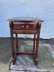 lot 136 image: WOOD NIGHTSTAND WITH DRAWER 26T x 16W. MINOR BUT, ALSO NORMAL WEAR AND TEAR