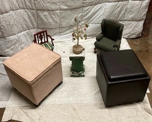 lot 243 image: LOT OF 6 1&2) STORAGE OTTOMANS. THE BROWN LID FLIPS OVER & FOLDS OUT TO ME A SMALL TABLETOP. 3&4) TWO DOLL CHAIRS ONE WOOD WITH PADDED SEAT AND A SOFA CHAIR 5) SMALL COLLUMN 6) SMALL EASTER TREE. BOTH STORAGE OTTOMANS MEASURE 15T x 14W  x 14L.