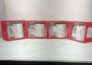 lot 255 image: LOT OF 4 STILL IN BOX WINTERCHRISTMAS MUGS. SEE PICS FOR DETAILED DESIGNS. 4T x 4.5DIAM.