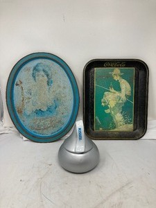 lot 257 image: 2 weathered serving trays, one Coca Cola & one Pepsi approximately 13.5Lx 10.5W AND A Hershey Kisses Bowl, gray with  white handle 6.5T x 4.5W x 4.5 D