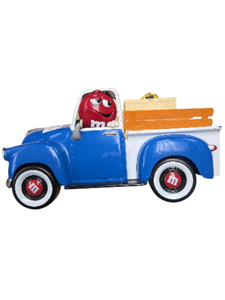 lot 142 image: M&M TOY TRUCK WITH 2 M&M CHARACTERS IN THE TRUCK