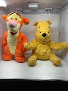 lot 277 image: Stuffed Animals,  Winnie is 20T   9W AND Tigger is 20T    6W