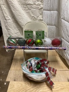 lot 282 image: Happy Holidays Box of 6,  5-inch Tree Ornaments AND A Medium Size Bag Full of Normal Size Ornaments (Guessing 40) AND a Large Roll of Wrapping Paper AND a Large Red Plaid Bow AND 2 Large Spools of Gold Ribbon