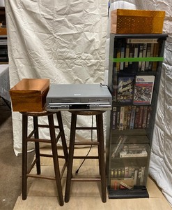 lot 286 image: DVD & VCR Player With Some DVDs & VCR Tapes, DVD Box 17W  4T and the Wooden  VCR Case is 12W & 49T