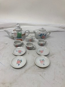 lot 288 image: 3-Part Lot    1)Vtg 1980s Porcelain Elephant Mini Tea Set, 4T.  2)2 Ceramic Children Reading Books, 2.5T,  3)  11 Piece Battat Ceramic Pink, Mini Tea Set