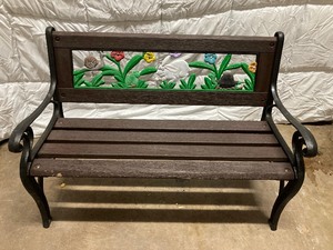 lot 183 image: LITTLE BENCH BROWN WITH GREEN GARDEN MOTIF, FLOWERS AND RABBIT BENCH IS 32W x  21T  x 12 TO SEAT.