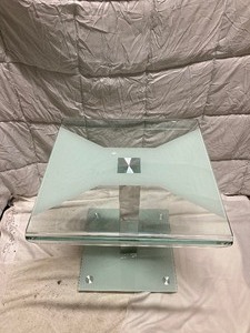 lot 195 image: VINTAGE TABLE WITH A CONTEMPORARY LOOK.  GLASS TOP WITH A METAL PEDISTAL BASE. 60W x 23T.
