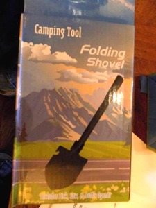lot 62 image: CAMP FOLDING SHOVEL - NEW IN BOX
