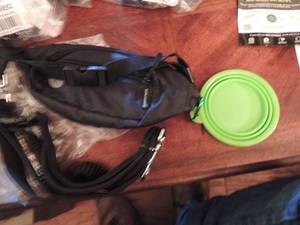 lot 107 image: Doggie fanny pack  leash, bowl and waste bags NEW IN PKG