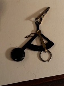 lot 206 image: Vintage 19301940 era protractor watch fob with keychain original case