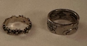 lot 195 image: 2 silver toned rings one size 9 one size 10