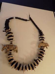 lot 135 image: Wood necklace with animals