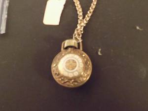 lot 147 image: Avon perfume necklace