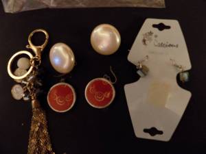 lot 203 image: pairs of earrings  and key clip