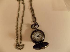 lot 178 image: New pendant watch with floral design on one side eagle on other