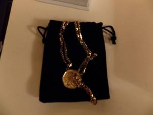 lot 224 image: Mint and Lilly gold necklace with coin