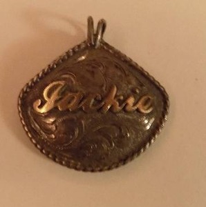 lot 242 image: Custom western silver necklace drop and jacking on front on back love Aaron