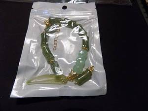 lot 258 image: Green jade like bracelets
