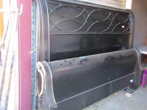 lot 34 image: king size black wooden bed frame side rails and slats