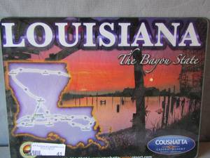 lot 41 image: Louisiana the bayou state glass wall sign