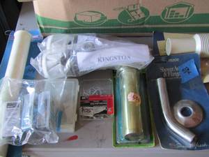 lot 52 image: paint pan, screws, shower piece and flange, garbage disposer piece new