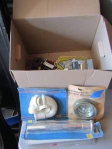 lot 69 image: kitchen sink strainer, shower handle, shower head, and more