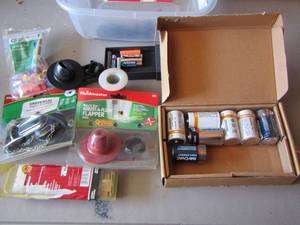 lot 70 image: D batteries, toilet flapper, and more
