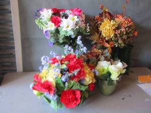 lot 67 image: various floral arrangements with vases