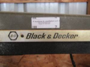 lot 7 image: Black and Decker DeWalt 3 cut table saw